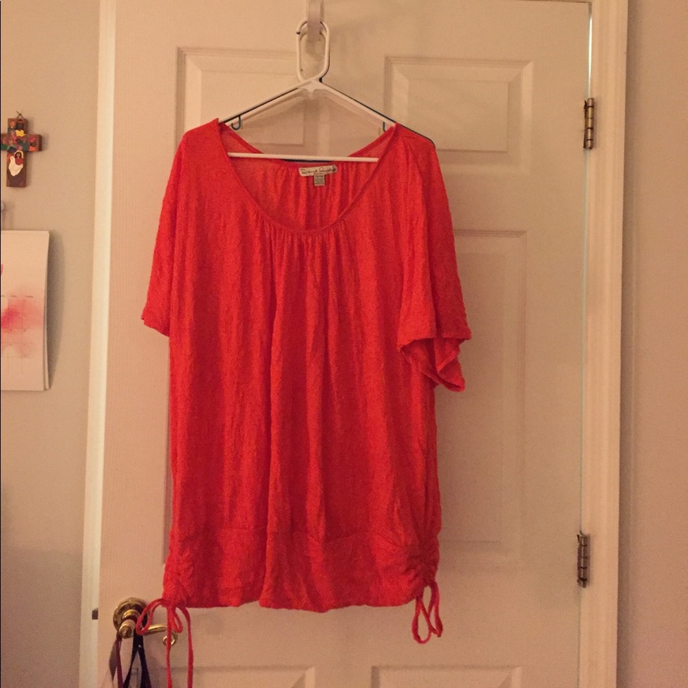 Coral shirt with ties on bottom