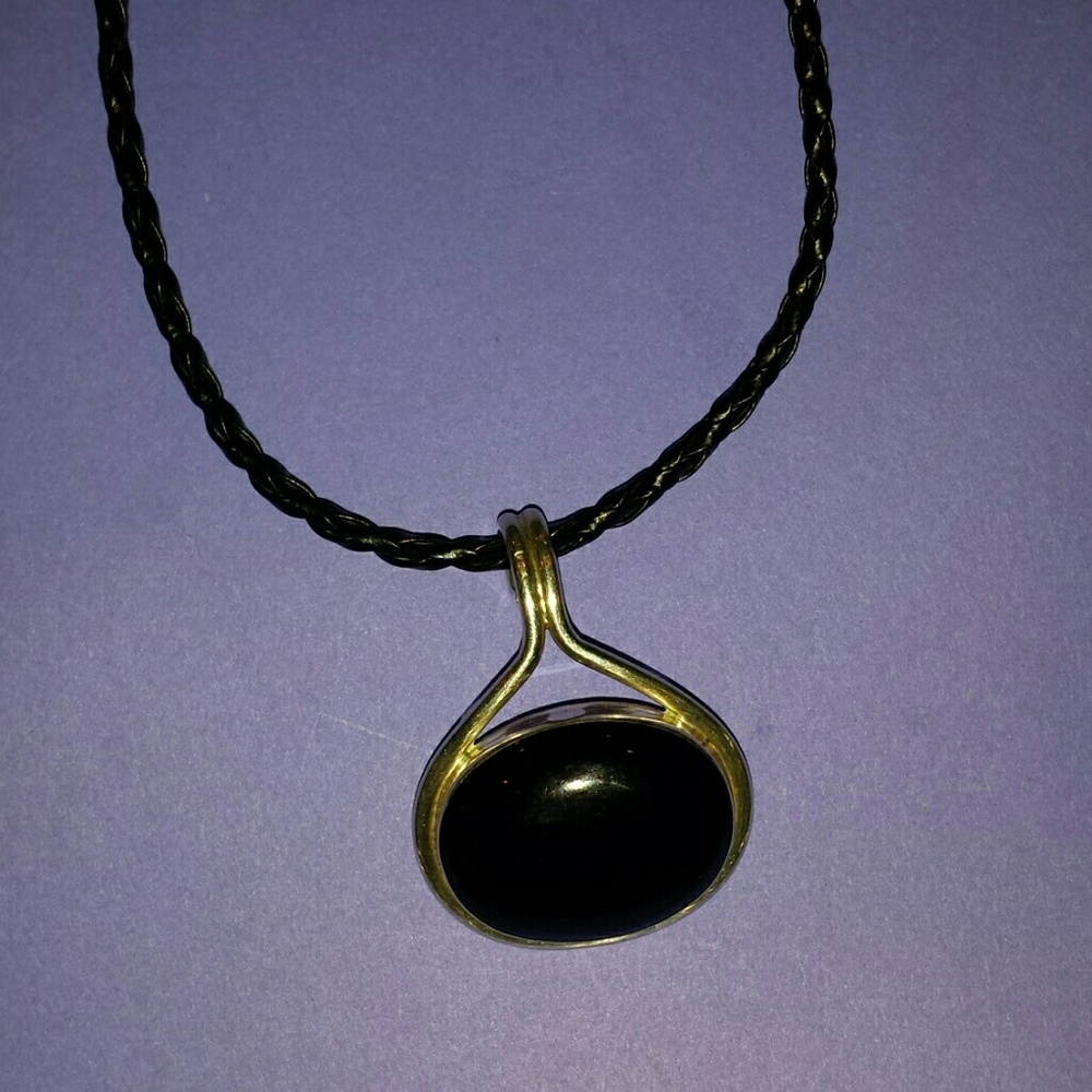925 SILVER AND ONYX PENDANT W/BLACK BRAIDED. CORD
