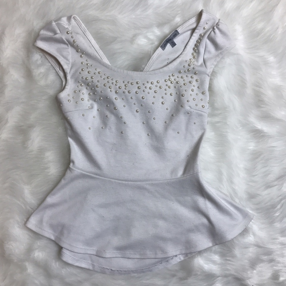 Pearl Peplum Top