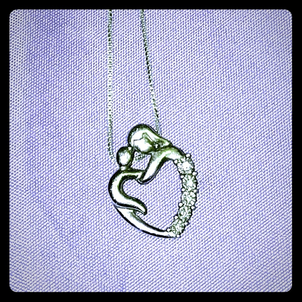 Mother and child silver pendant