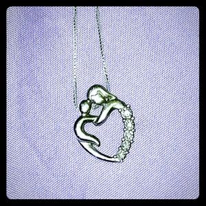 Mother and child silver pendant