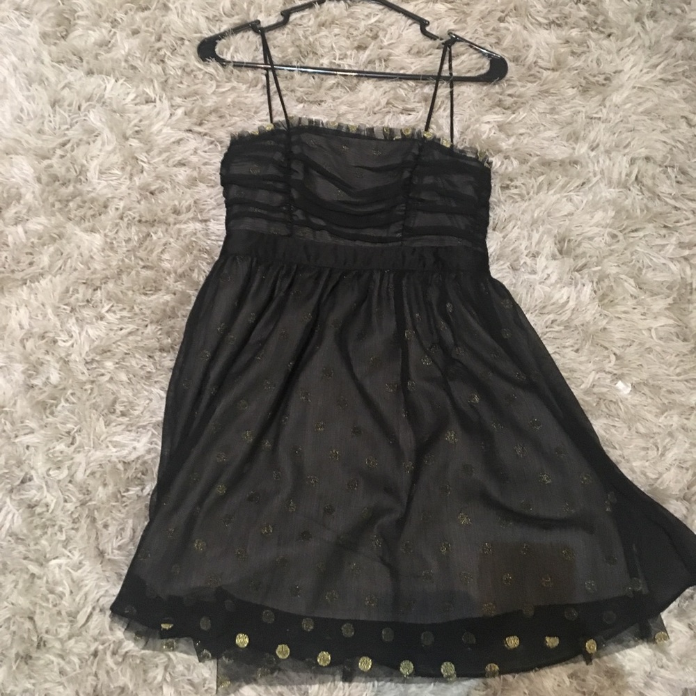 Black and gold polka dot dress