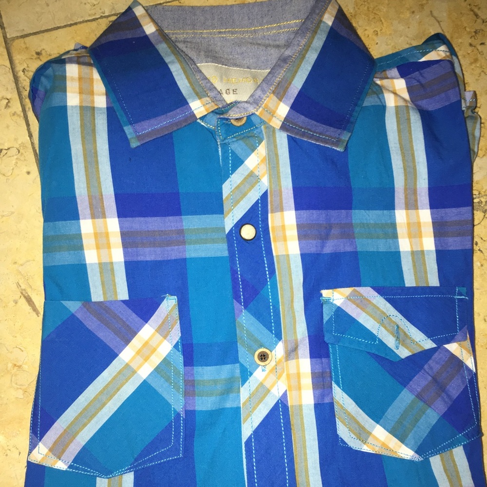 Never worn button down long sleeve shirt