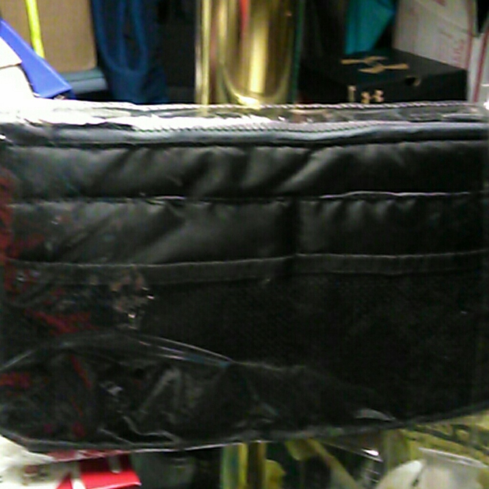 Space saver for purse/make-up bag/travel bag