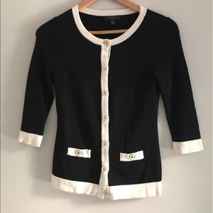 Black and white cardigan with gold details