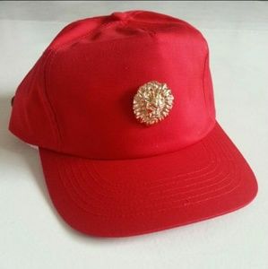 Gold lion red strap back hat