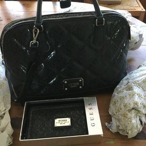 Guess! Wallet and purse.