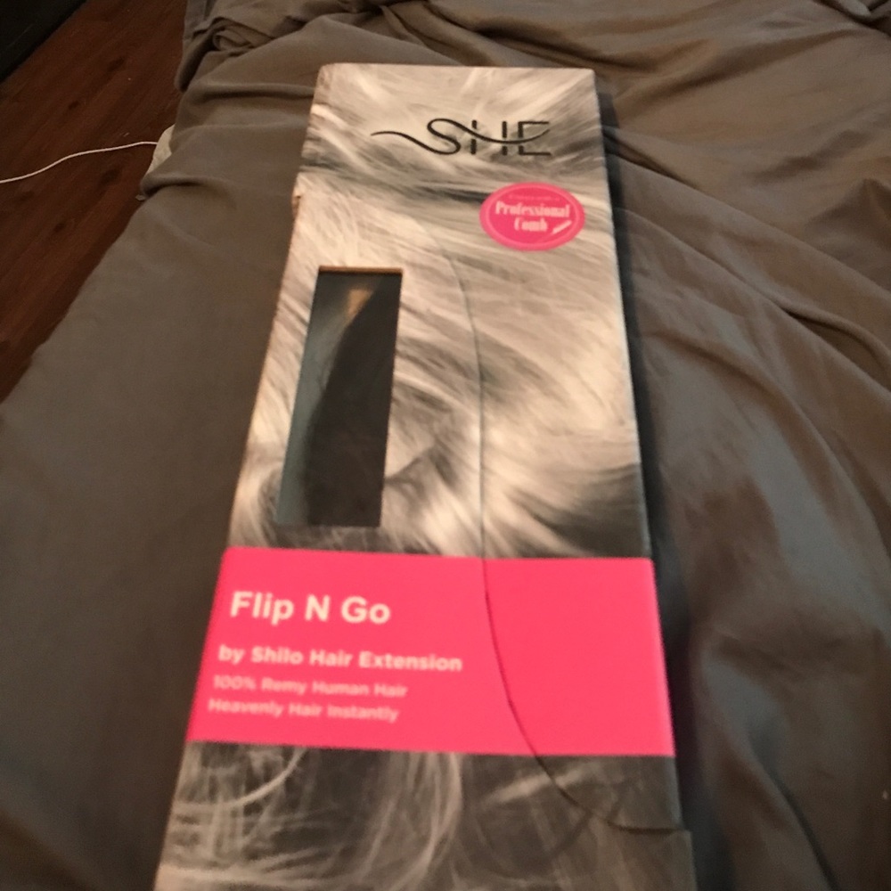 Flip and go hair extensions by She.  Never used!