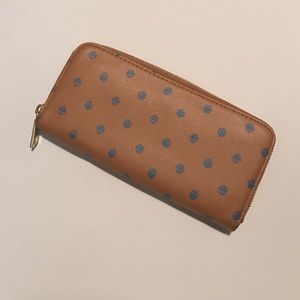 Tan wallet with blue dots