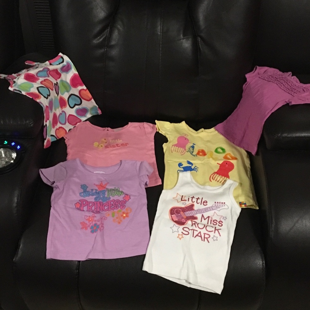 Girls variety of shirts. All size 12 months.