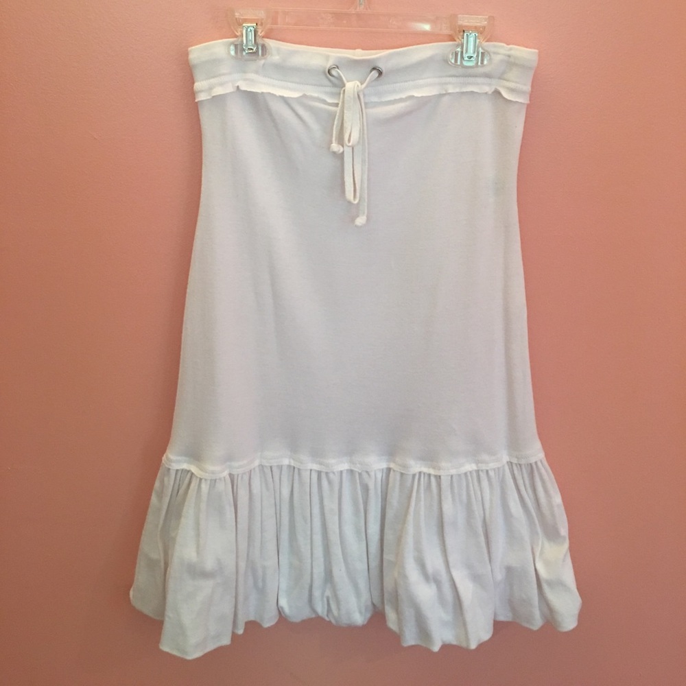 White ruffled skirt