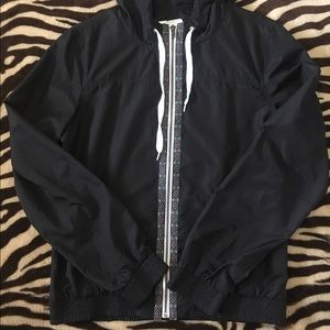 Zine, black windbreaker