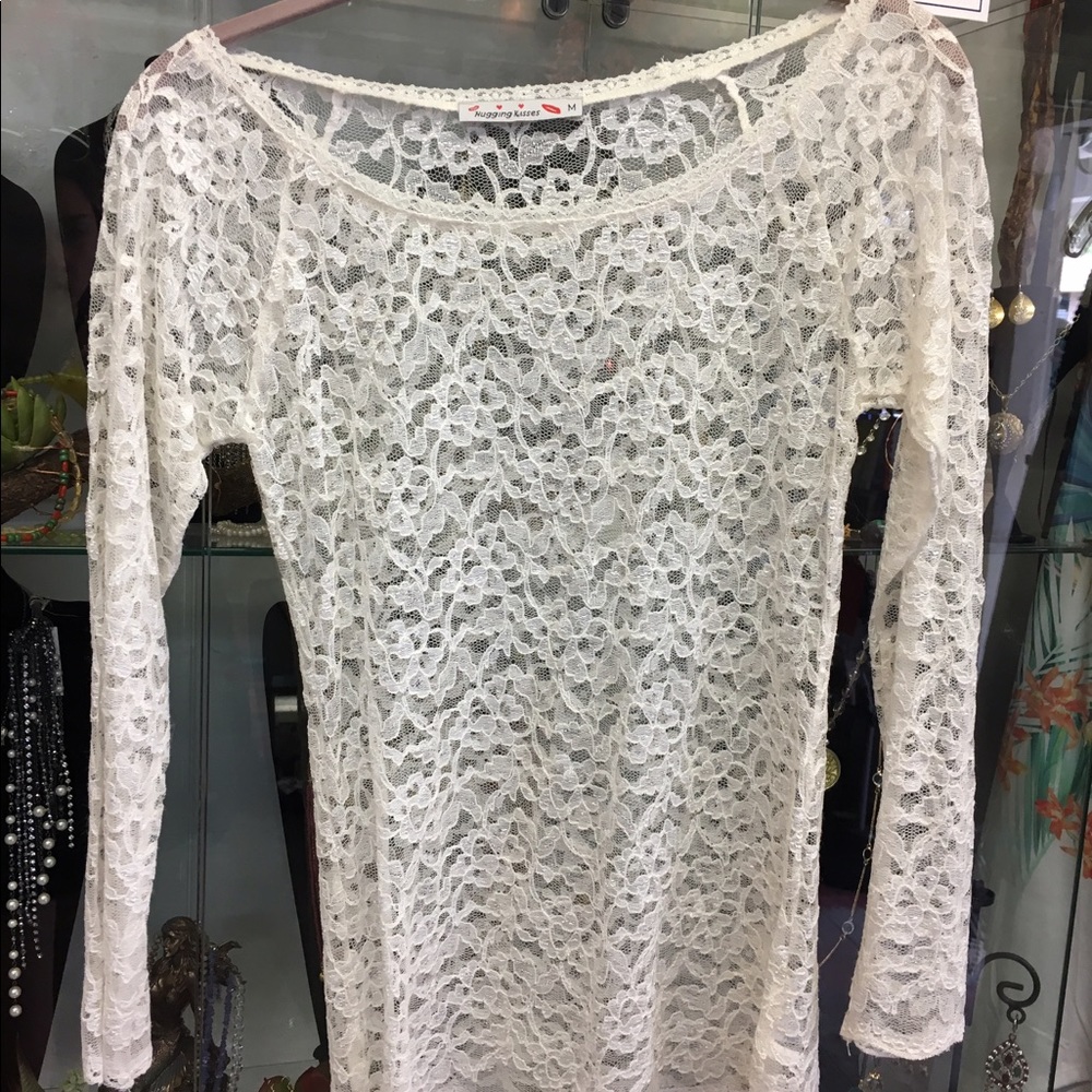 Lace long sleeve white top. Never worn