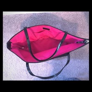 Black Kate Spade tote with pink interior