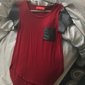 Red T shirt with leather sleeves and pocket