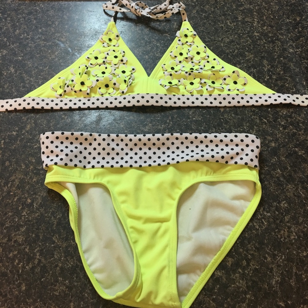 Justice neon yellow and polka dotted swim suit!