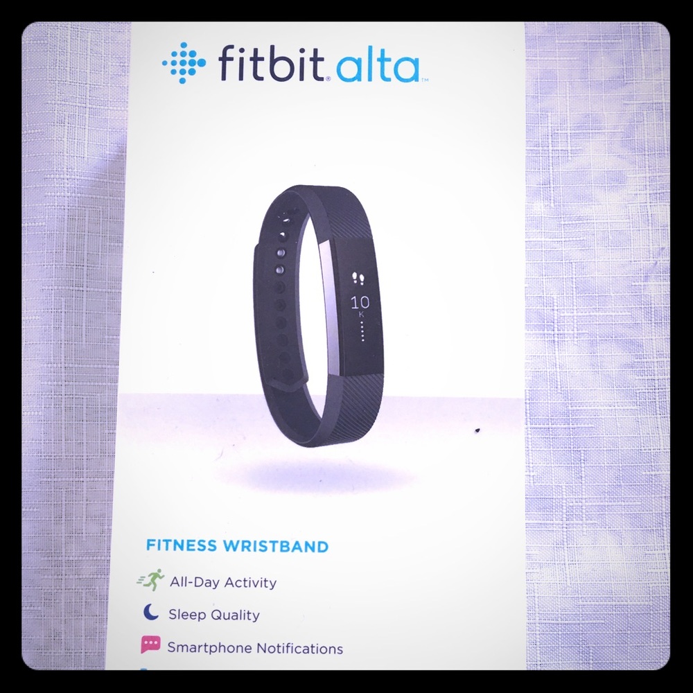 Fitbit Alt like new in box.