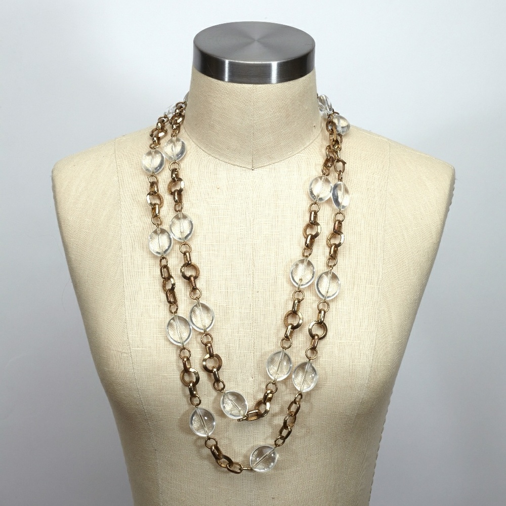 Extra long clear acrylic and antique gold necklace