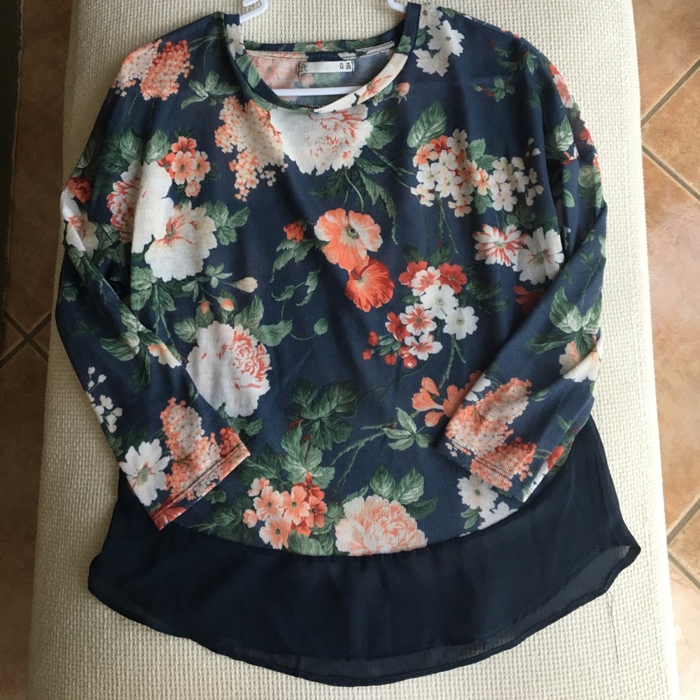 Sheer Flowered Long Sleeve Blouse.