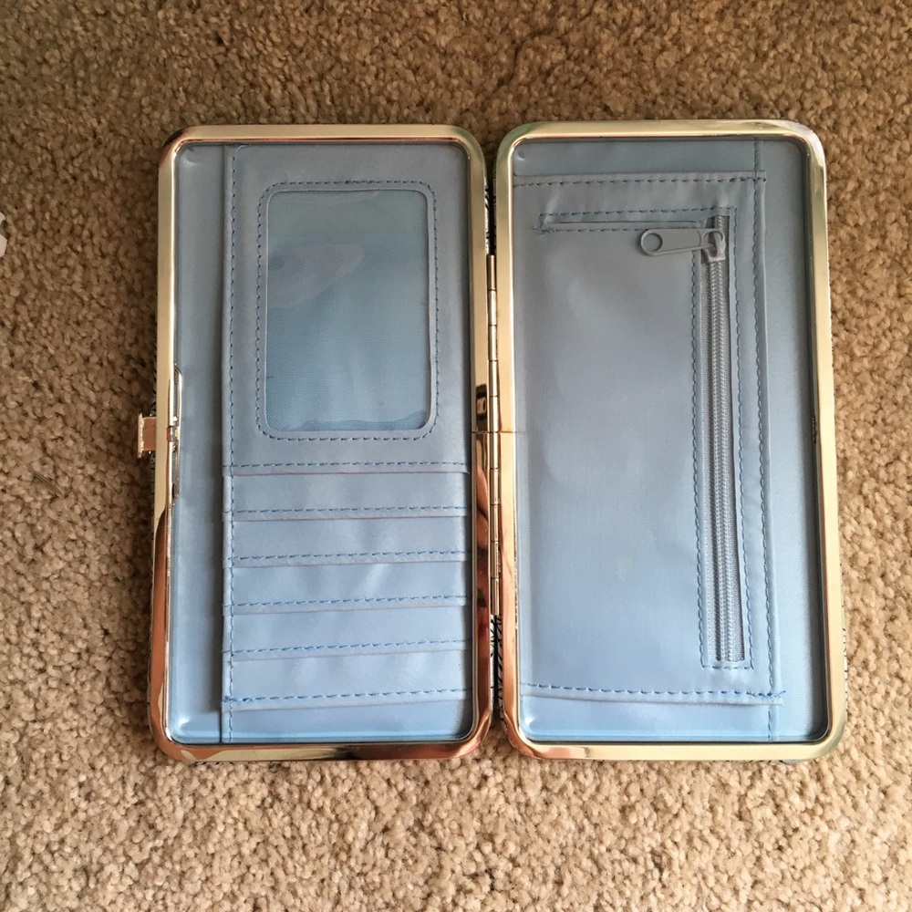 Silver wallet with blue and green accents