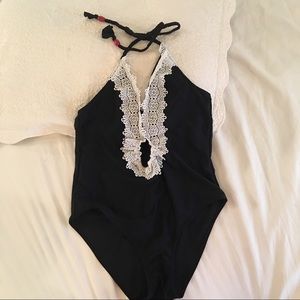 Black one piece with straps and lace details!