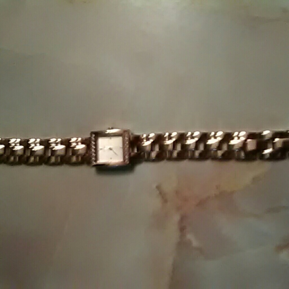 Gold tone watch