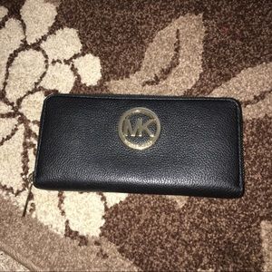 Like new authentic Michael Kors black wallet!