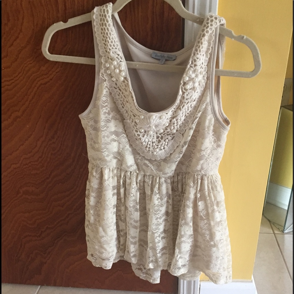 Nice shirt top; tannish color.