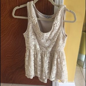 Nice shirt top; tannish color.