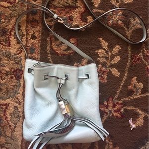 Baby blue Kate spade bucket crossbody