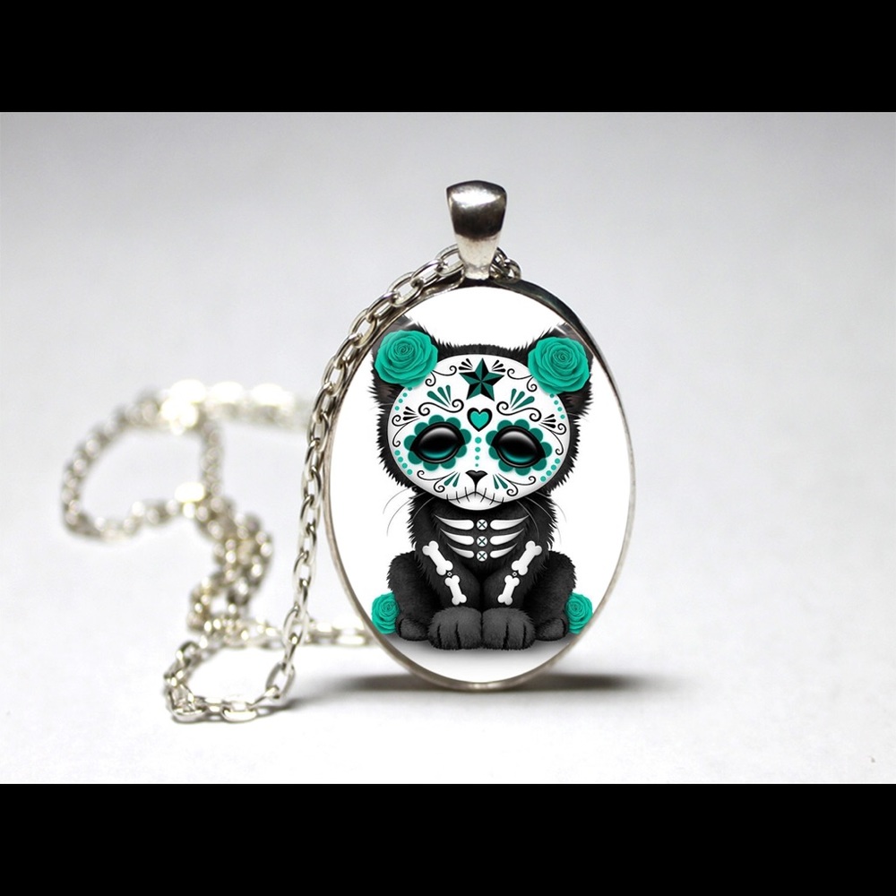 Day of  dead sugar skull dead kitty pendant .