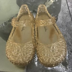 Baby gold jelly shoes