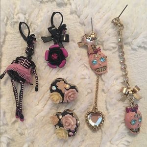 Betsey Johnson earrings plus one generic.