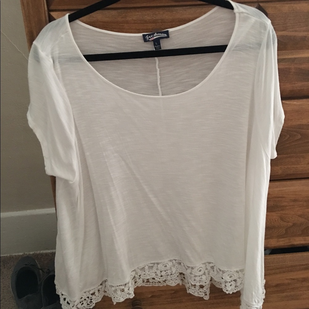 White shirt with lace on the bottom