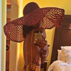 Big floppy sun hat. Perfect for a day at the beach