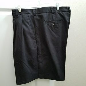 Black Izod shorts.