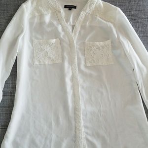 White blouse with lace accents