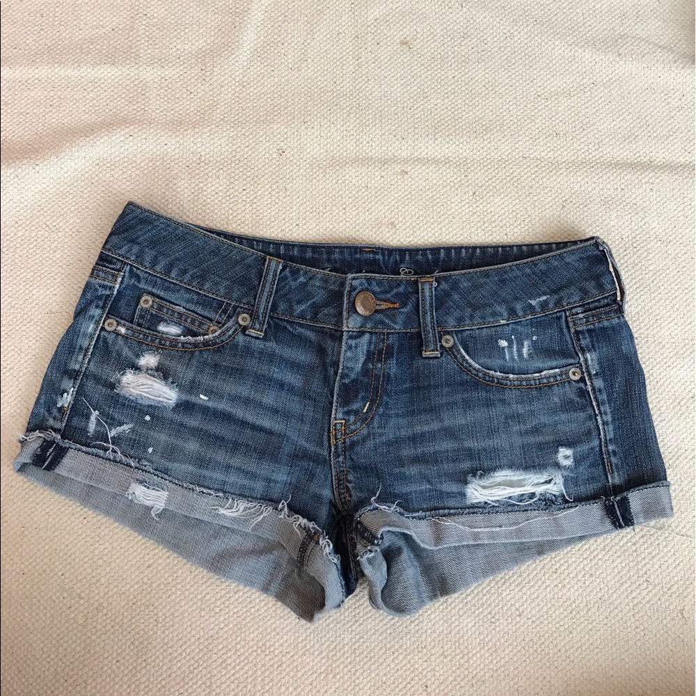 Distressed, dark wash American Eagle jean shorts