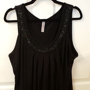 Black tank top with beaded design around the neck