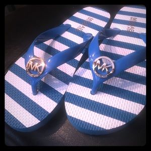 Micheal Kors flip flops
