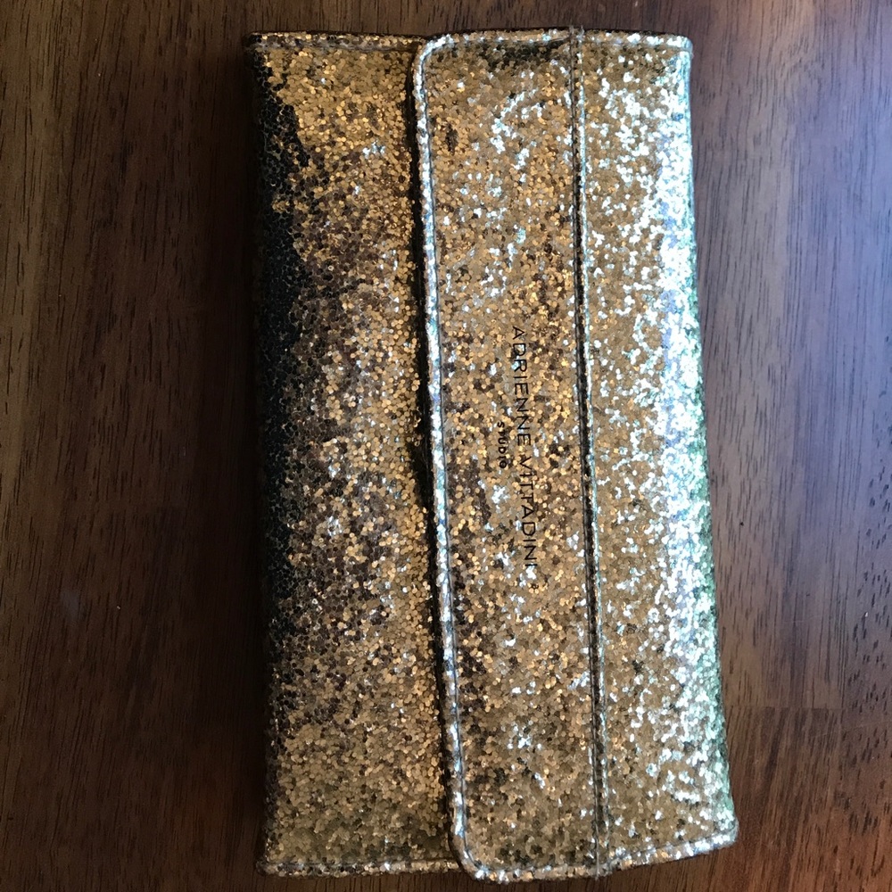 This is an Adrienne Vittadini wallet.