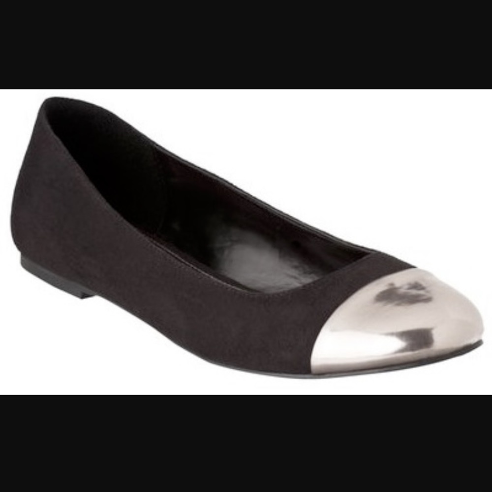 Black flats with silver toe