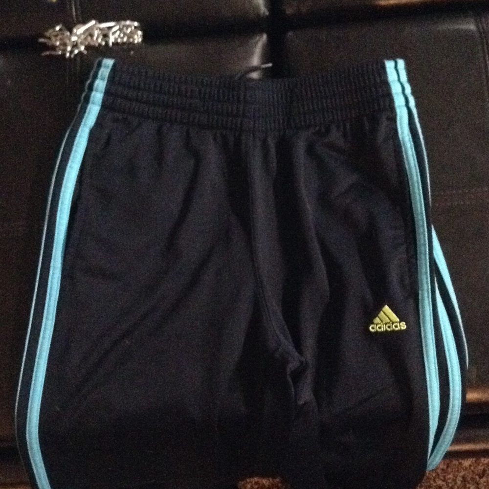 Adidas black sweatpants with light blue stripes