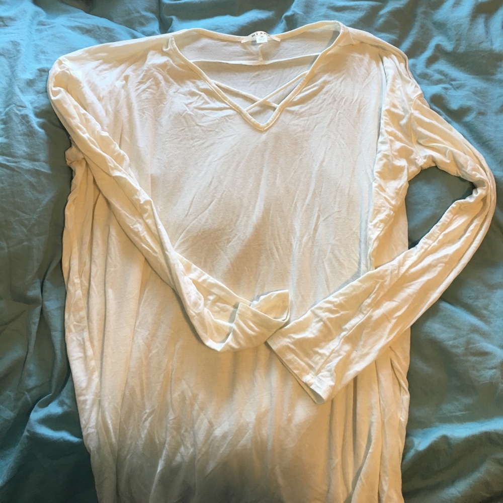 V-neck long sleeve with swoop on back