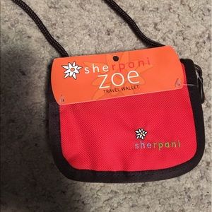 Sherpani Zoe Wallet/ Cross body bag
