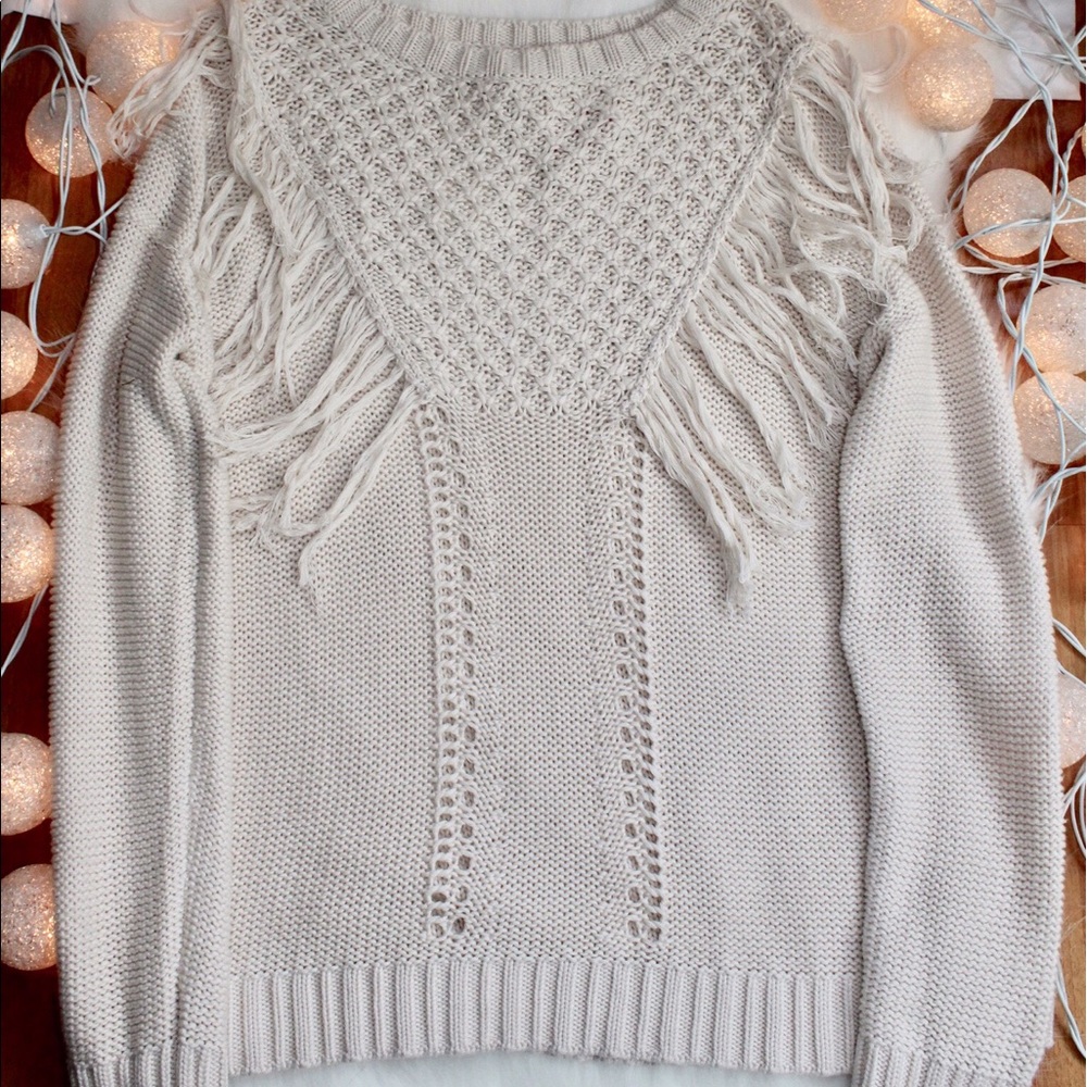Long sleeve woven sweater.