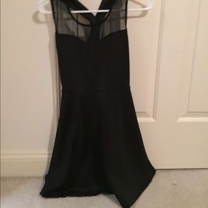 Black fit and flare dress with mesh neckline!