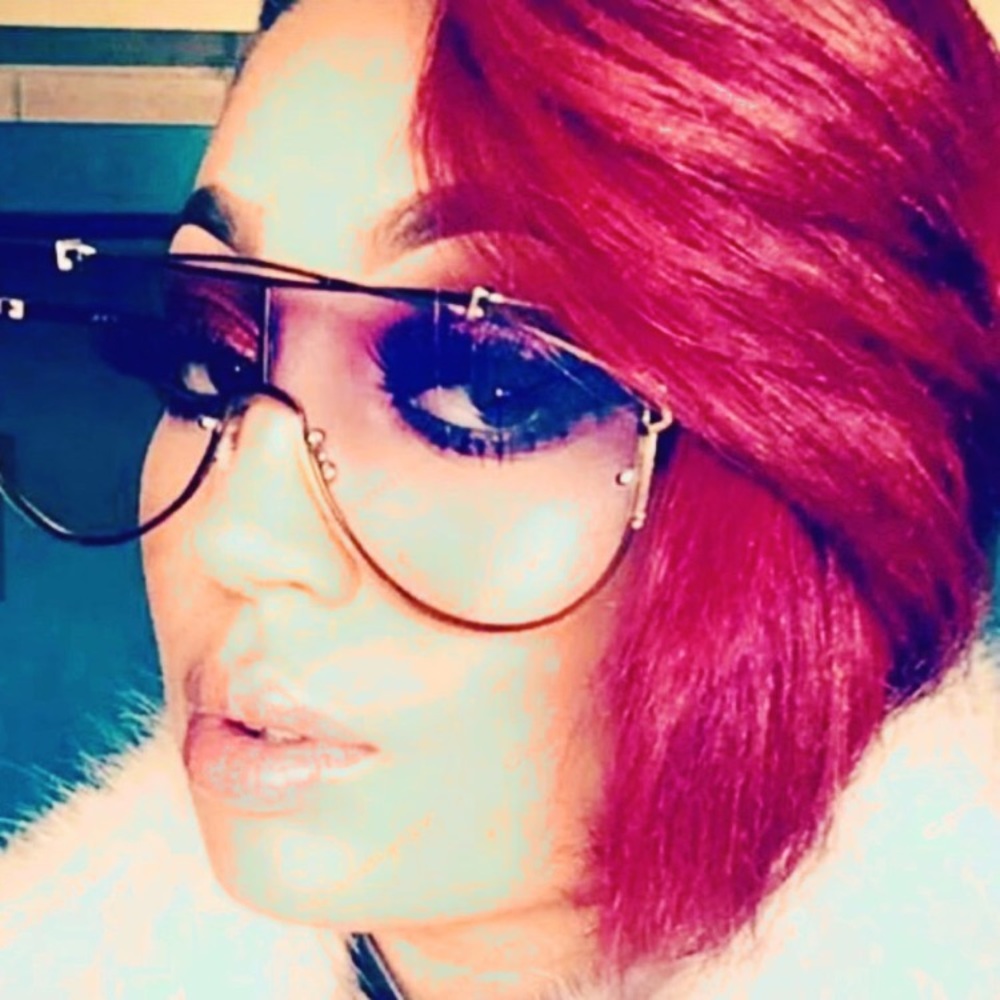 Gold framed clear glasses
