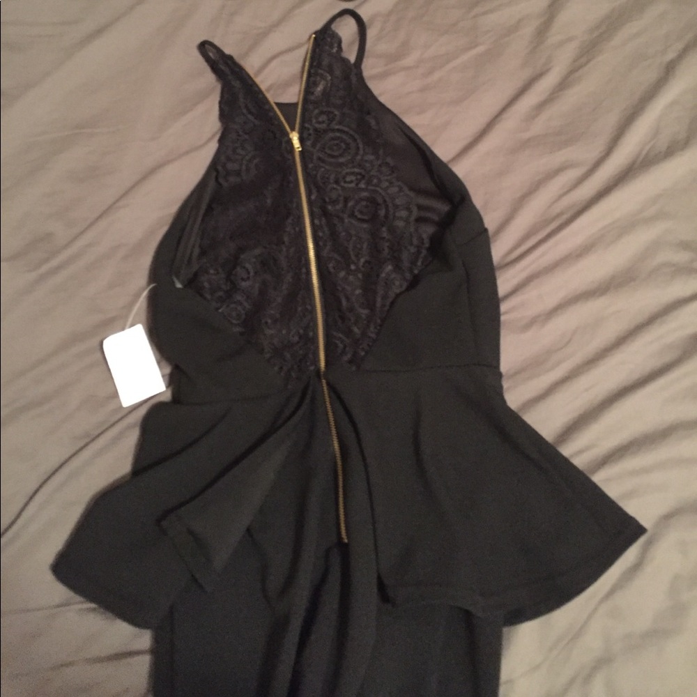 Black peplum dress with lace back