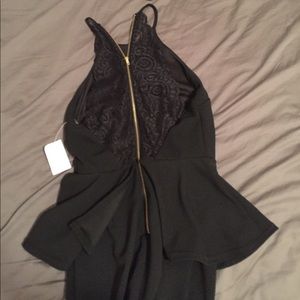 Black peplum dress with lace back